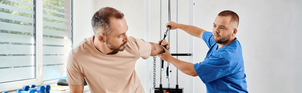 Physical health man exercising with instructor.